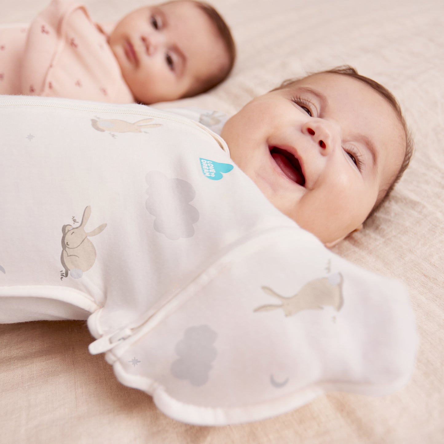 Swaddle Up™ Transition Bag 1.0 TOG Stretch Cotton Cloud Bunnies White M