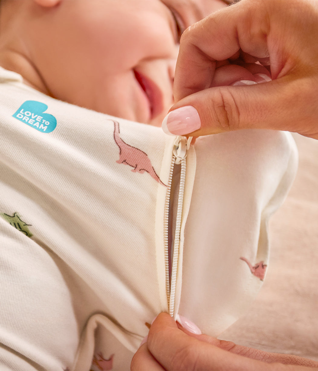 Swaddle Up™ Transition Bag 1.0 TOG Cotton Cream Dino Snore
