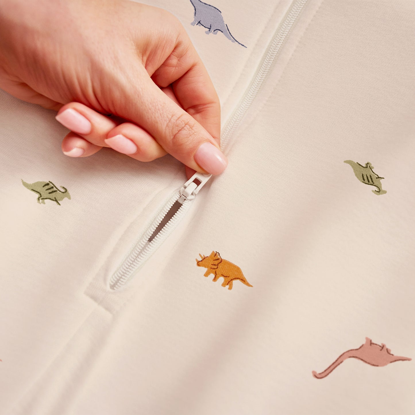 Swaddle Up™ Transition Bag 1.0 TOG Cotton Cream Dino Snore